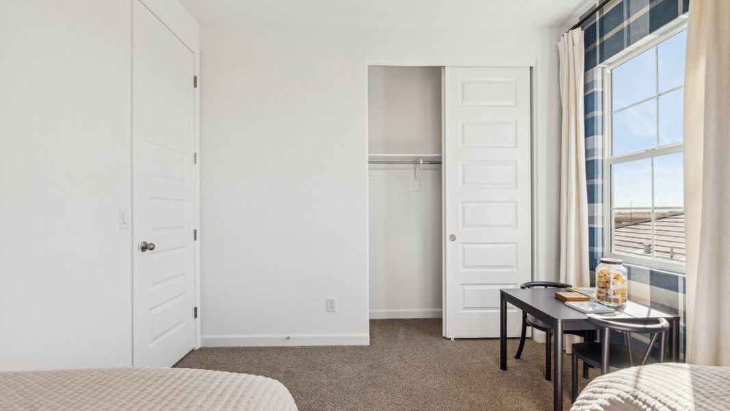 Representative furnished interior of a home built from the Yellowstone by D.R. Horton in Westpark, Buckeye (Image 36).