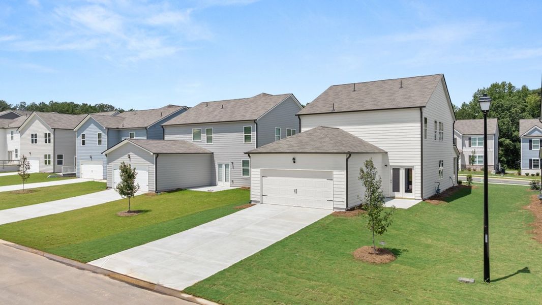 Representative exterior photo of a completed home built from the Irwin ll by D.R. Horton in Braselton Village, Braselton, GA (Image 18).