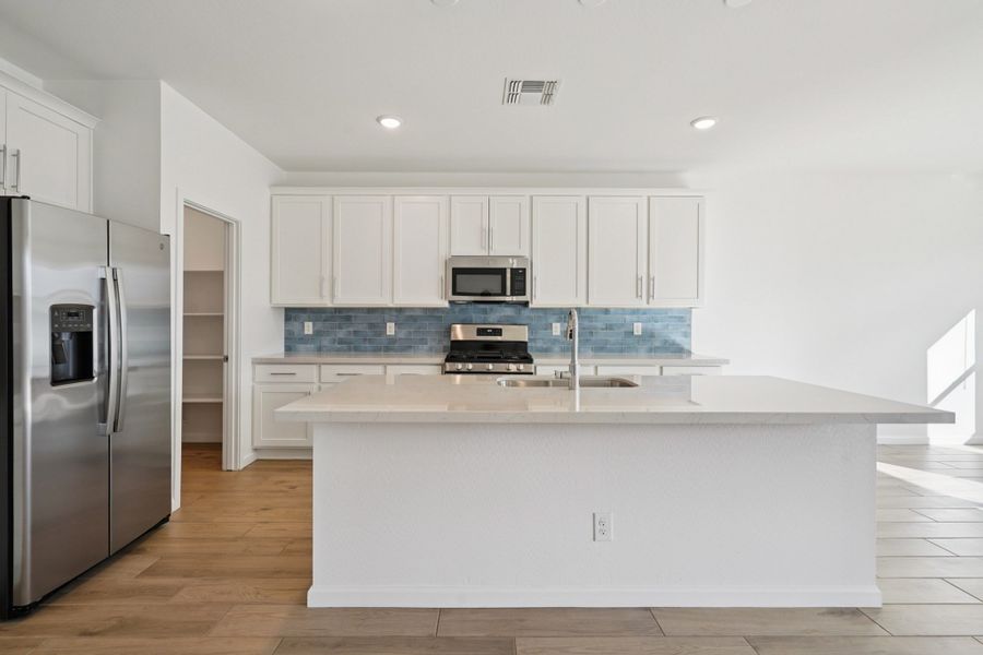 Kitchen featuring the Coastal Collection. Finishes may vary, see Sales Counselor for details