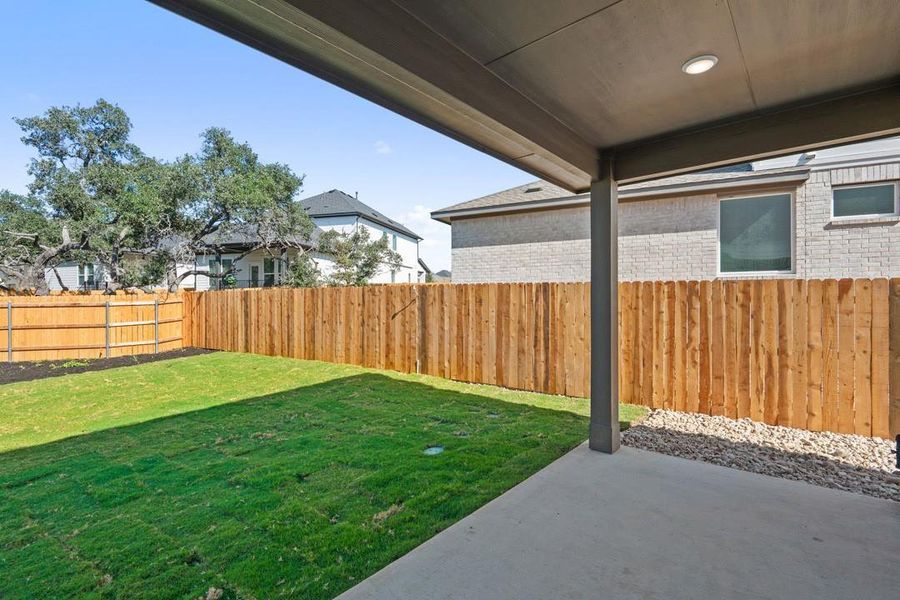 Exterior details and patio area of a home in Terrace Collection at Heritage, Dripping Springs (Image 20).