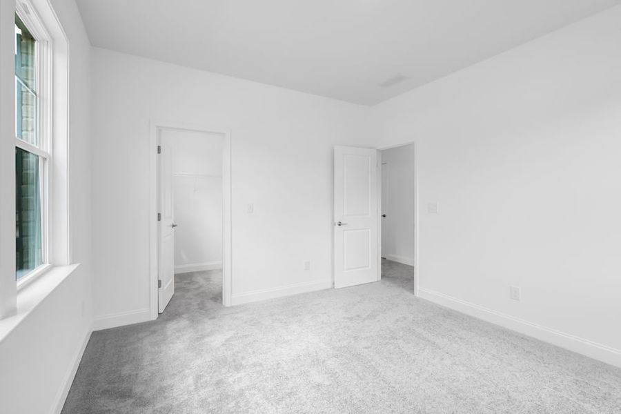 Representative unfurnished interior of a home built from the Kirkwood by Taylor Morrison in Bennett Farm, Loganville (Image 24).