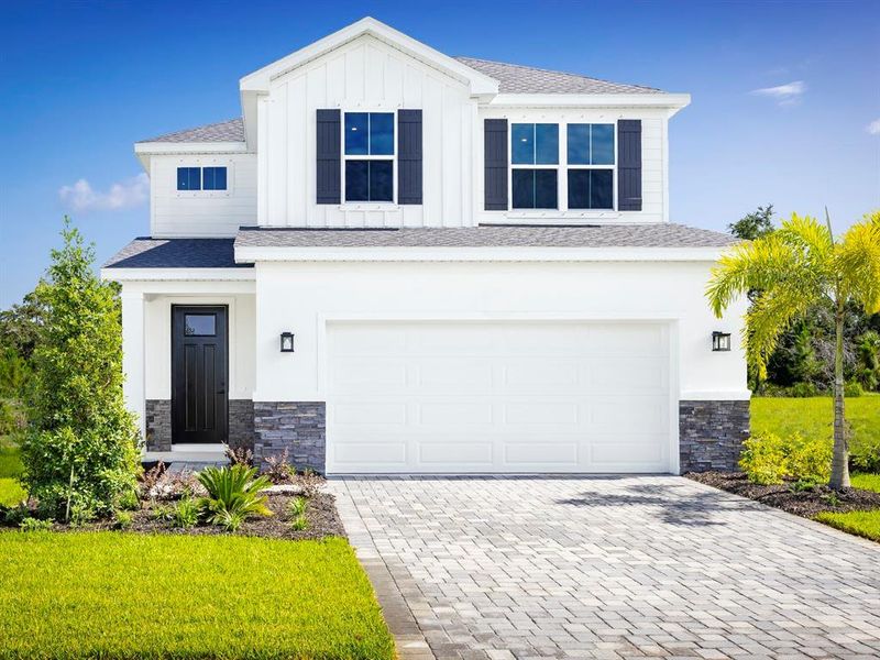 Front exterior of a new home in Malabar Springs, Palm Bay, FL, highlighting curb appeal (Image 1). Front exterior of a new home in Malabar Springs, Palm Bay, FL, highlighting curb appeal (Image 1).