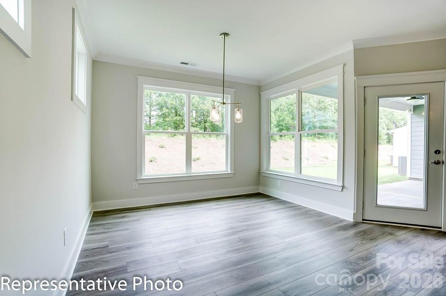 Breakfast area with door to covered rear porch Breakfast area with door to covered rear porch