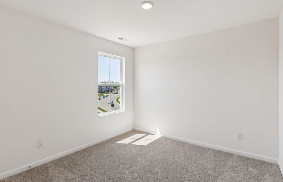 Spacious, unfurnished interior of a new home in Highlands of Carter's Station, Columbia (Image 26).