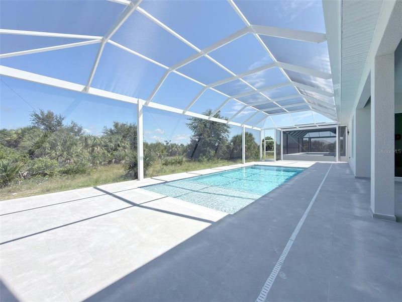 Exterior details and patio area of a home in , Port Charlotte (Image 26).