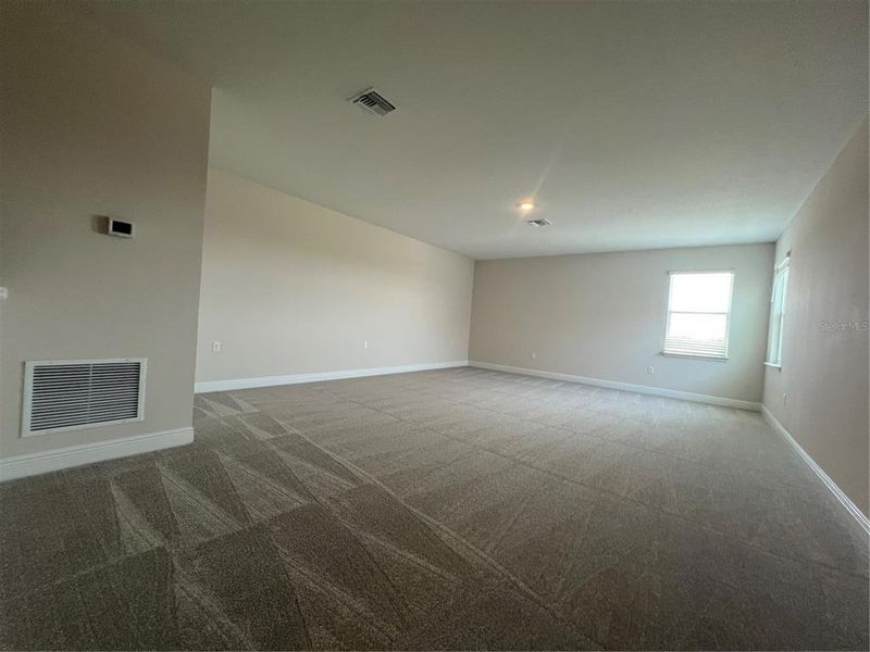 Spacious, unfurnished interior of a new home in Hills of Minneola, Minneola (Image 18).
