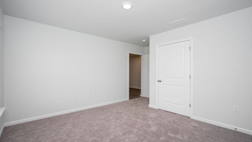 Representative unfurnished interior of a home built from the KERRY by D.R. Horton in Stanbury Creek, Supply (Image 17).