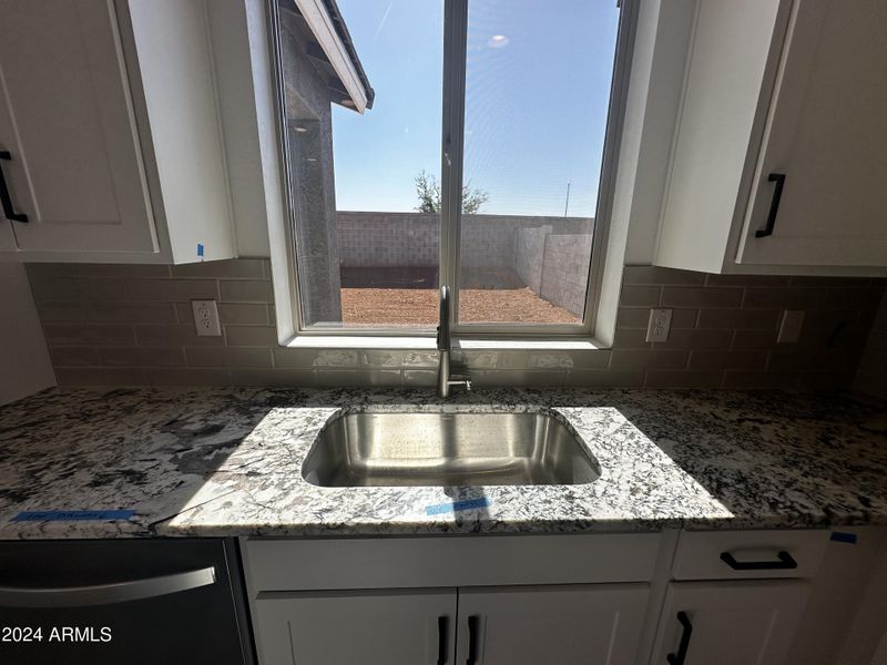 17- Sink over looking window to backyard