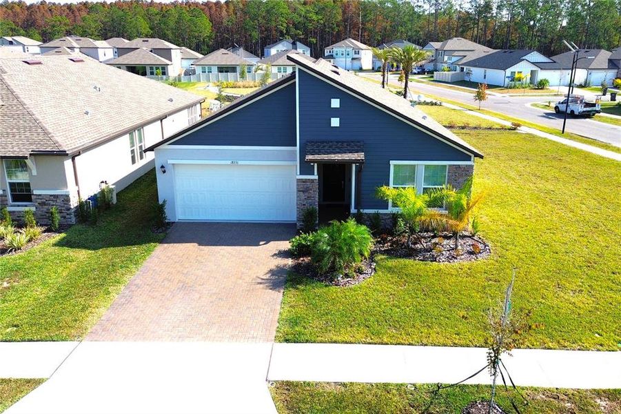 Front exterior of a new home in , Lutz, FL, highlighting curb appeal (Image 22).