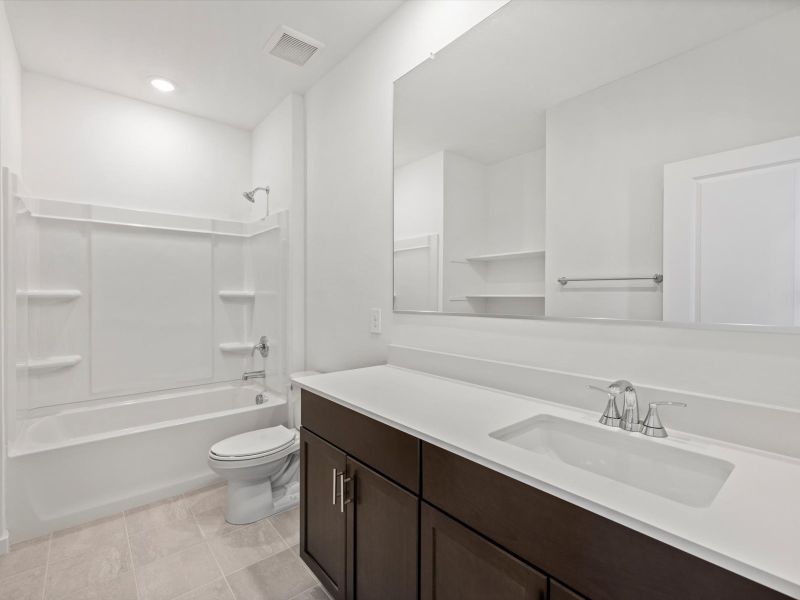 Furnished interior view inside a new home in Mountain View Estates Reserve Series, Buckeye (Image 7).