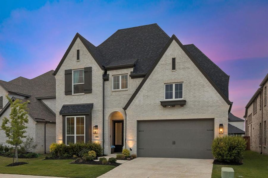 Front exterior of a new home in Mosaic, Celina, TX, highlighting curb appeal (Image 2). Front exterior of a new home in Mosaic, Celina, TX, highlighting curb appeal (Image 2).