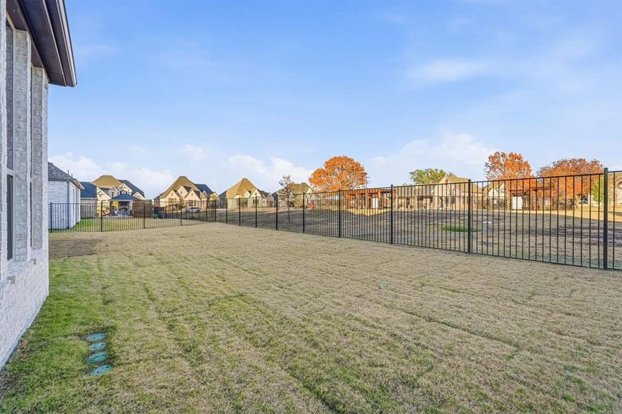 Exterior details and patio area of a home in Saddle Star Estates, Rockwall (Image 20).