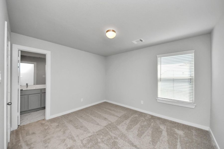 Generously sized secondary bedrooms featuring spacious closets, soft and inviting carpeting underfoot, large windows allowing plenty of natural light, and the added touch of privacy blinds for your personal retreat. Generously sized secondary bedrooms featuring spacious closets, soft and inviting carpeting underfoot, large windows allowing plenty of natural light, and the added touch of privacy blinds for your personal retreat.