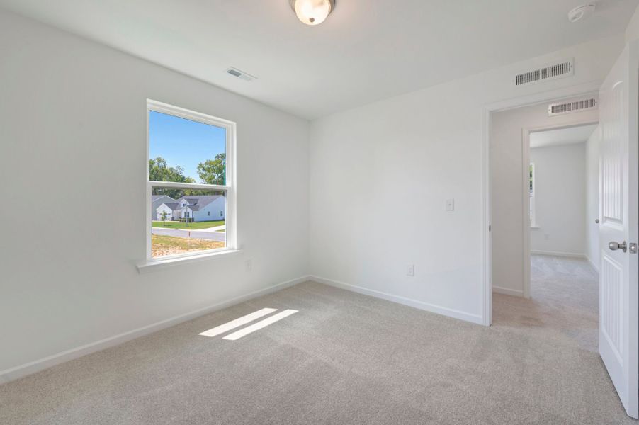 Spacious, unfurnished interior of a new home in Providence Creek, Fuquay Varina (Image 21).