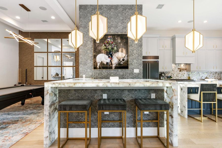 This home features a full service bar to entertain your guest with a refreshing drink. This home features a full service bar to entertain your guest with a refreshing drink.