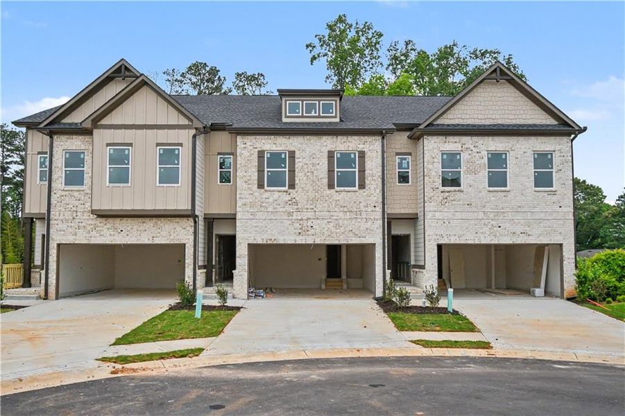 Front exterior of a new home in , Norcross, GA, highlighting curb appeal (Image 1). Front exterior of a new home in , Norcross, GA, highlighting curb appeal (Image 1).