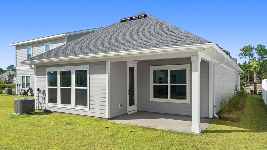 Exterior details and patio area of a home in Breakfast Point East Phase I, Panama City Beach (Image 2).