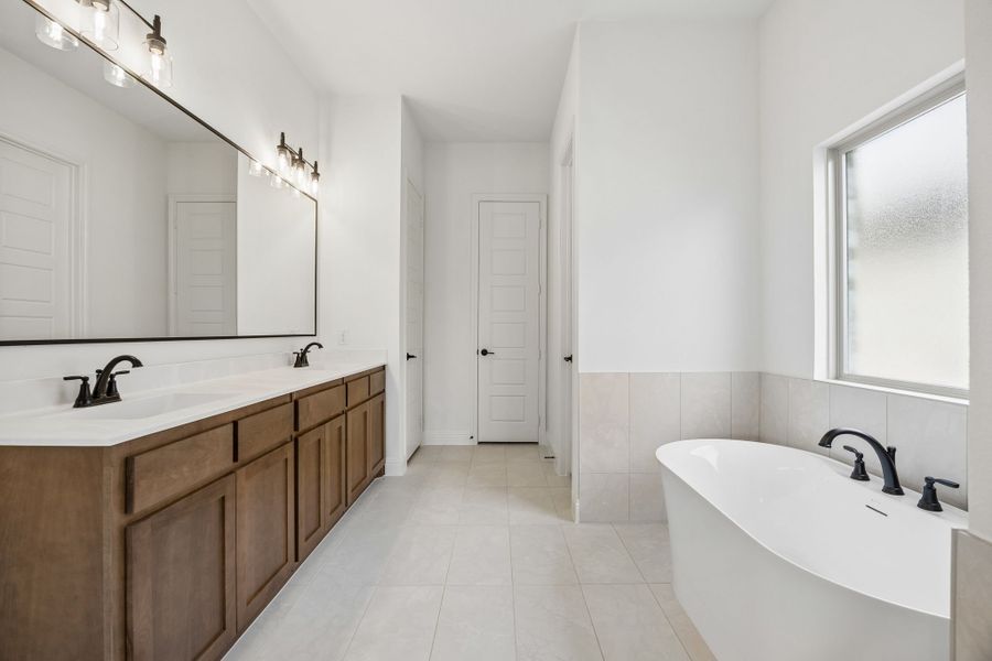Furnished interior view inside a new home in Country Lakes, Denton (Image 12).