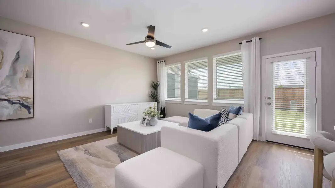 Representative furnished interior of a home built from the Jasmine by D.R. Horton in Palmi, Houston (Image 7).