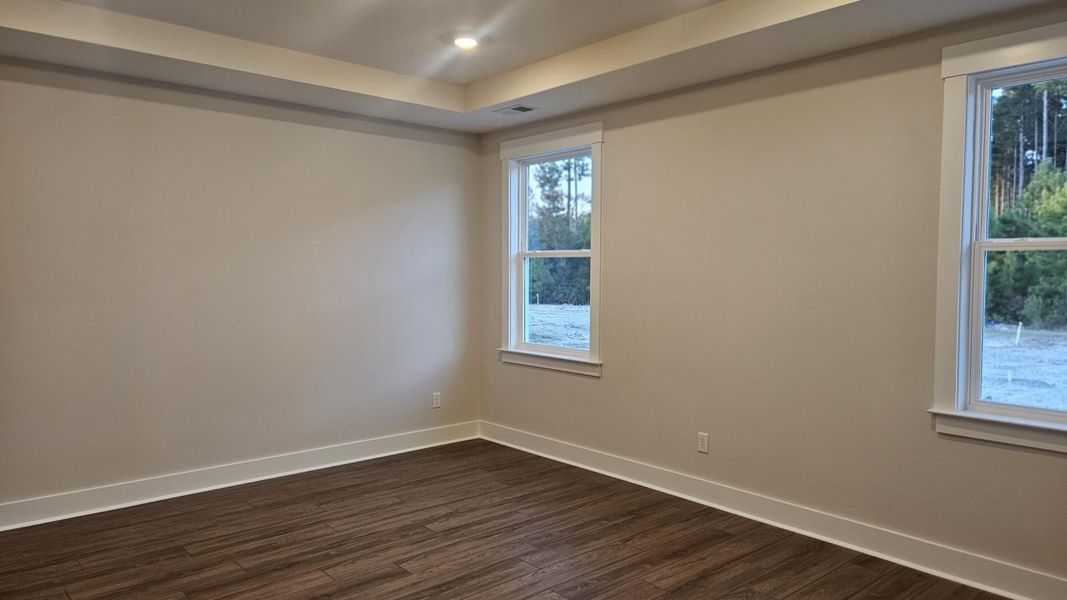 Spacious, unfurnished interior of a new home in The Enclave at French Quarter Creek, Huger (Image 12).
