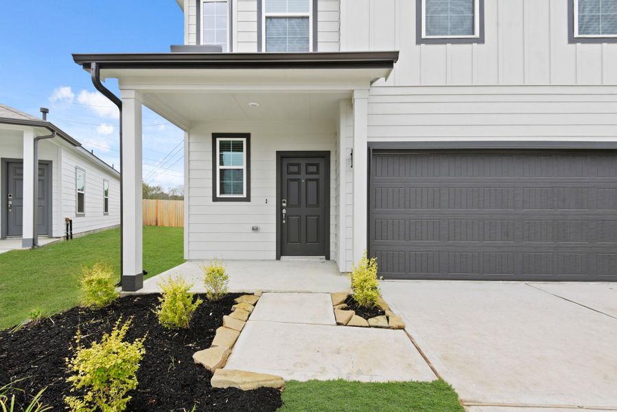 Exterior details and patio area of a home in Barrett Crossing, Crosby (Image 3).