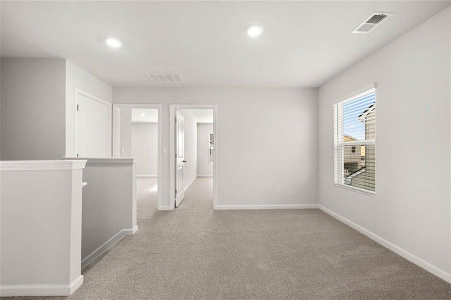 Spacious, unfurnished interior of a new home in Shoal Creek, Hampton (Image 20).