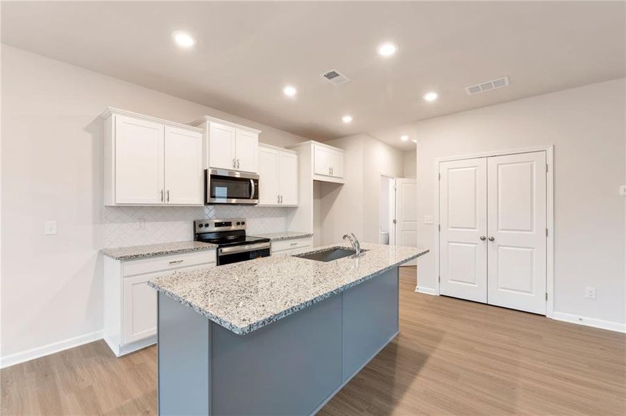Furnished interior view inside a new home in , Calhoun (Image 13).