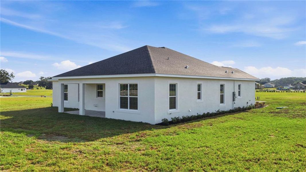 Exterior details and patio area of a home in , Ocala (Image 4).