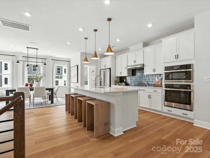 Gourmet Kitchen with Premium Finishes. *Model Photos | Actual Finishes, Structural Selection, and Orientation May Vary.