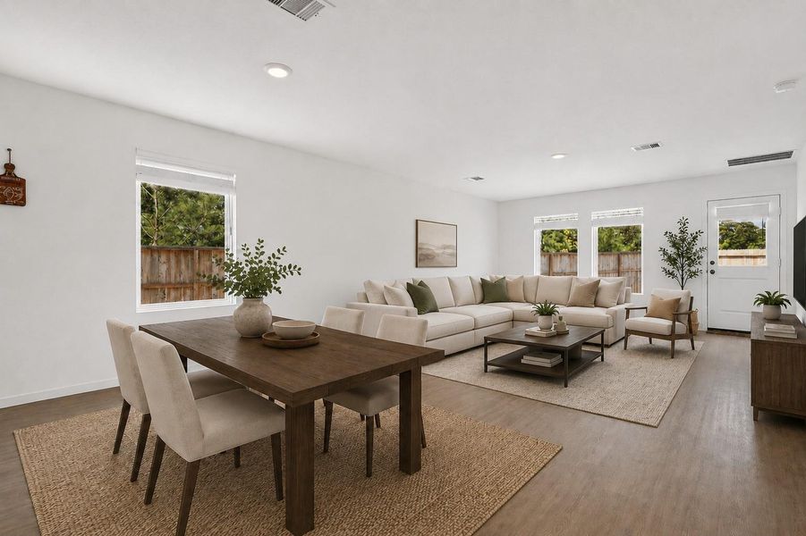 The open-concept design brings the kitchen, dining, and living spaces together for effortless everyday living and entertaining.