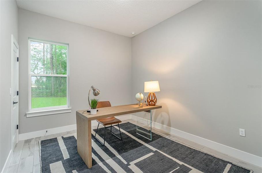 PHOTO OF MODEL HOME - SAME FLOOR PLAN ASIDE FROM LAUNDRY ROOM