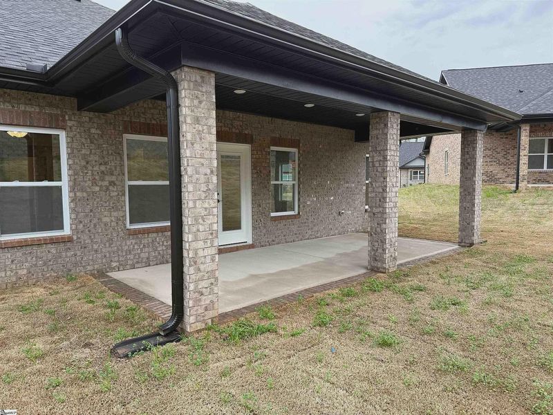 Exterior details and patio area of a home in Hidden Lake Estates, Greenville (Image 3).