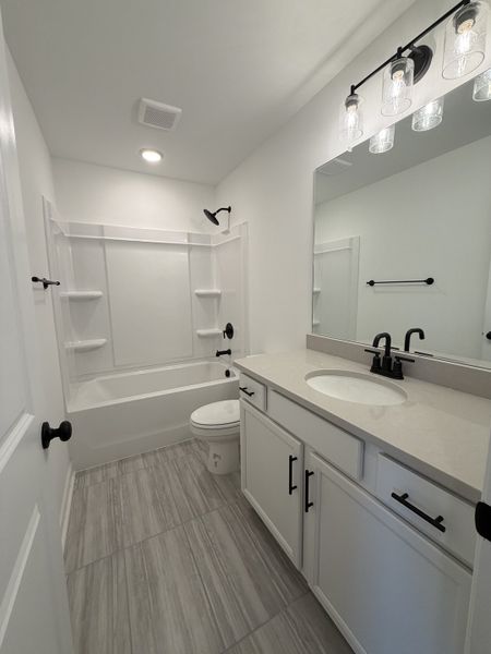 Furnished interior view inside a new home in Nexus Townhomes, Gallatin (Image 5).