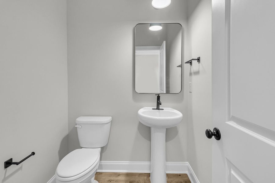 Furnished interior view inside a new home in Tidewater at Lakes of Cane Bay, Summerville (Image 6).