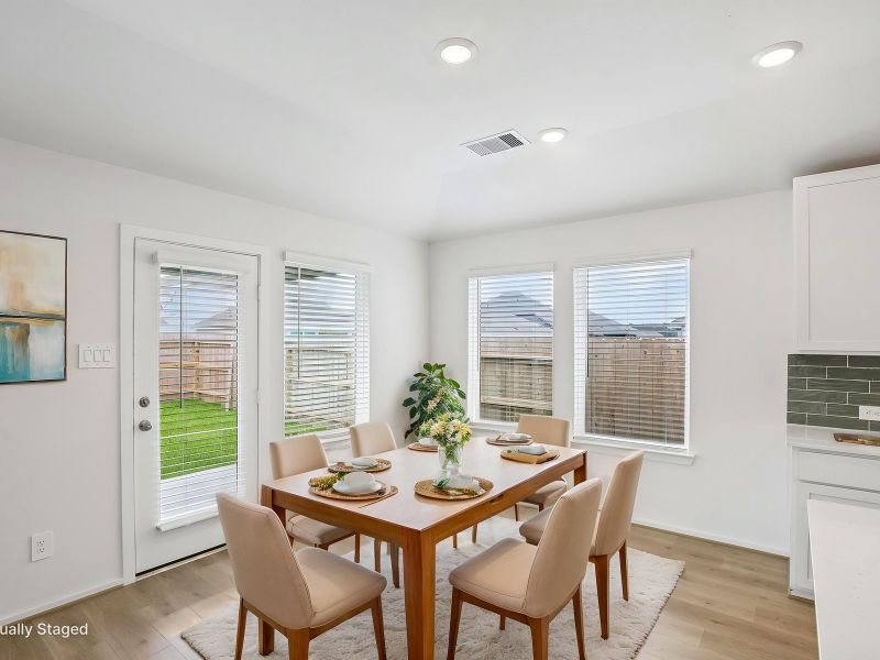 Furnished interior view inside a new home in Riviera Pines - Classic Series, Huffman (Image 6).
