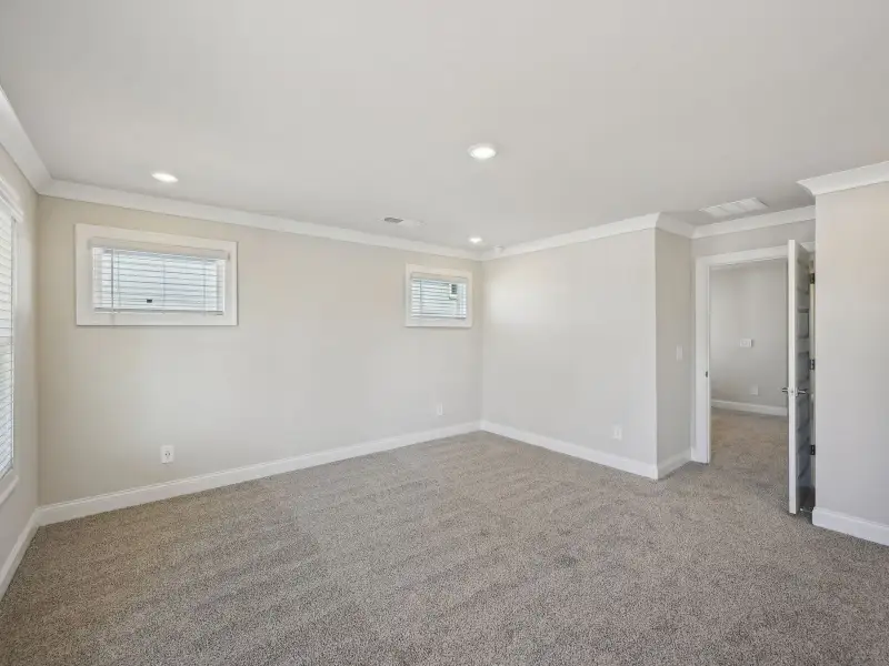 Spacious, unfurnished interior of a new home in Martin Springs - Cottage Series, Lawrenceville (Image 14).