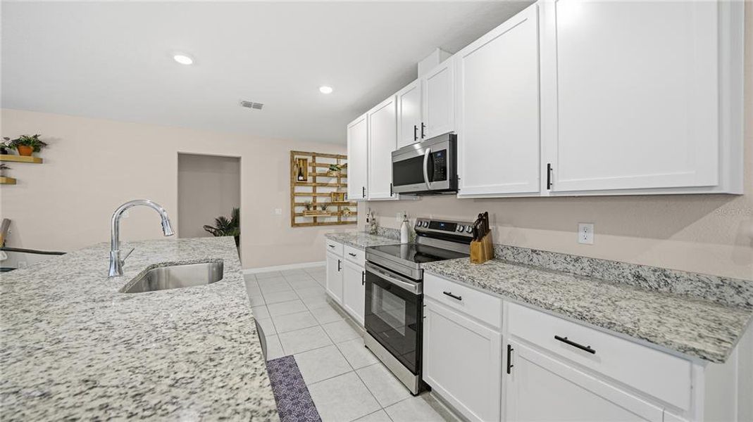 Furnished interior view inside a new home in Flagler Estates, Hastings (Image 35).