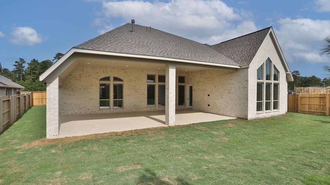 Exterior details and patio area of a home in Evergreen, Conroe (Image 4). Exterior details and patio area of a home in Evergreen, Conroe (Image 4).