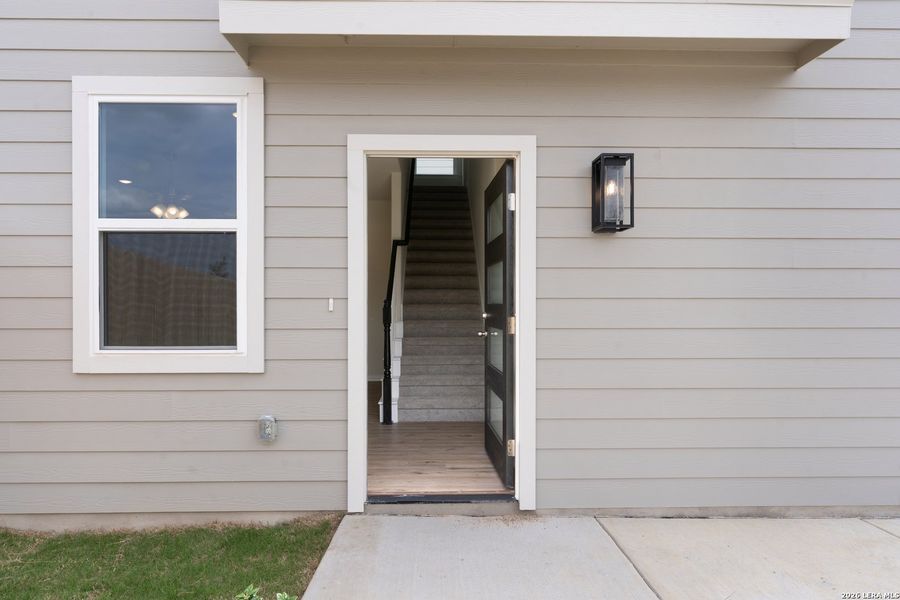 Exterior details and patio area of a home in Casinas at Gruene, New Braunfels (Image 3).