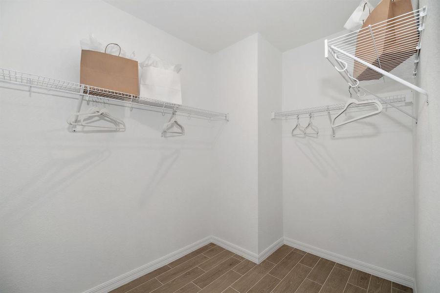 Primary Walk-in Closet Primary Walk-in Closet