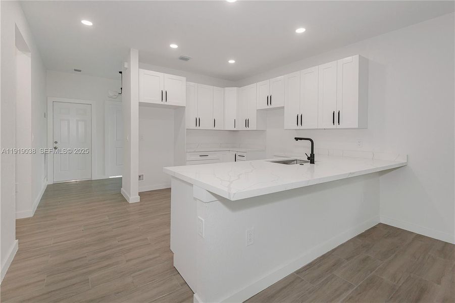 Furnished interior view inside a new home in , Oakland Park (Image 6). Furnished interior view inside a new home in , Oakland Park (Image 6).