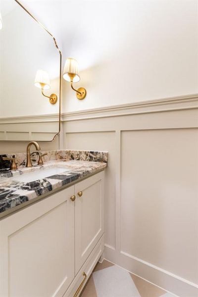 Custom vanity with a granite countertop and an undermount sink Custom vanity with a granite countertop and an undermount sink