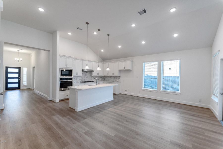 Furnished interior view inside a new home in Sunterra, Katy (Image 8).