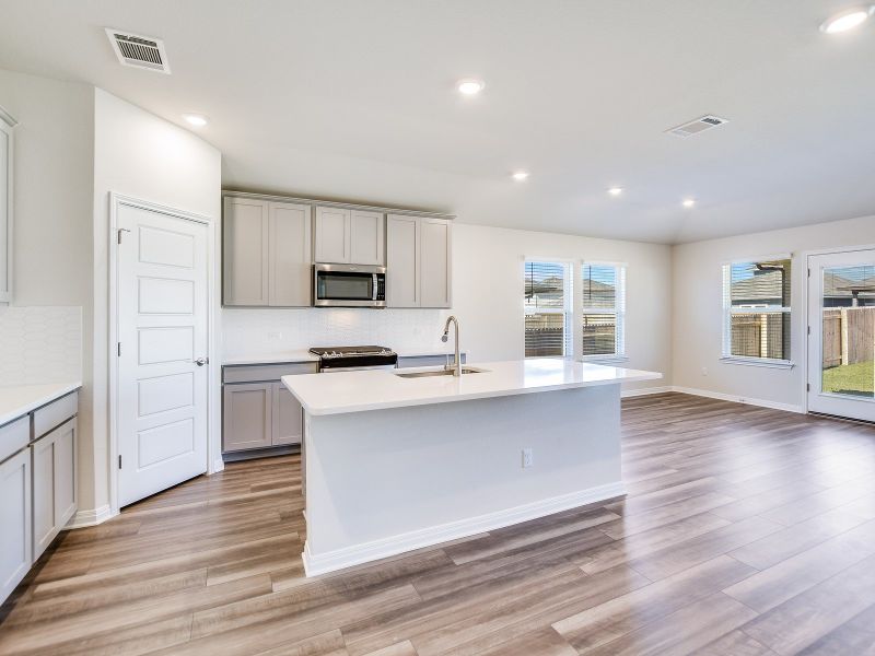 Furnished interior view inside a new home in Butler Farms - Boulevard Collection, Liberty Hill (Image 3).