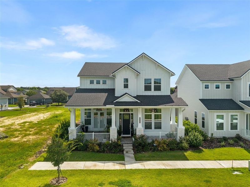 Front exterior of a new home in Oakmont, Gainesville, FL, highlighting curb appeal (Image 30). Front exterior of a new home in Oakmont, Gainesville, FL, highlighting curb appeal (Image 30).