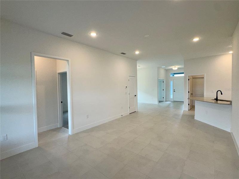 Spacious, unfurnished interior of a new home in Watercress Cove, North Port (Image 8).