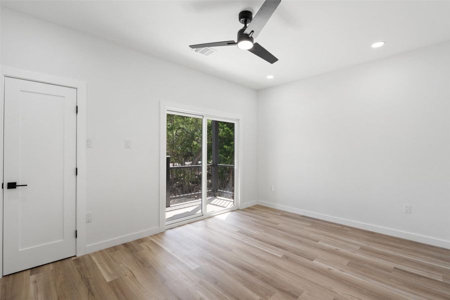 Unfurnished room with light wood-type flooring, recessed lighting, and ceiling fan Unfurnished room with light wood-type flooring, recessed lighting, and ceiling fan