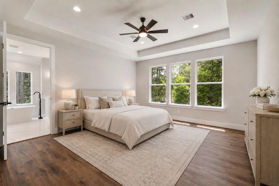 Experience this digitally staged, serene bedroom, bathed in natural light with elegant decor and a spacious layout, offering a tranquil retreat in your new home.