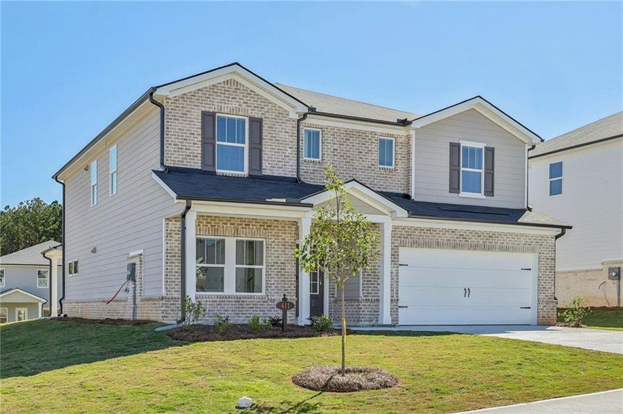 Front exterior of a new home in Parkside at Grayson, Grayson, GA, highlighting curb appeal (Image 2).