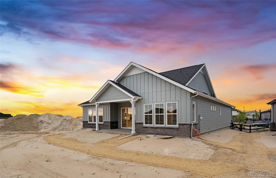 Exterior details and patio area of a home in Hilltop at Inspiration, Aurora (Image 33).